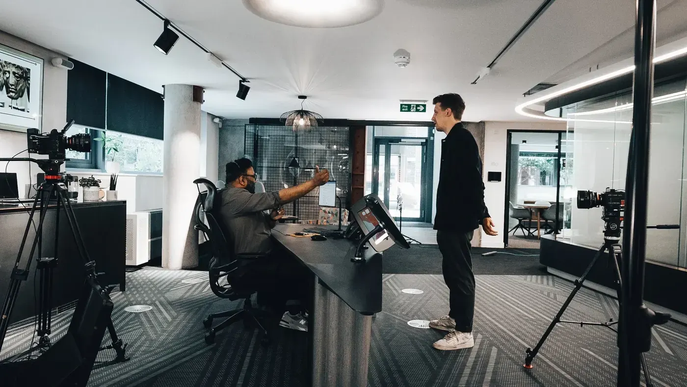 Sunil Patel and Mark G Smith rehearse a scene in the office set