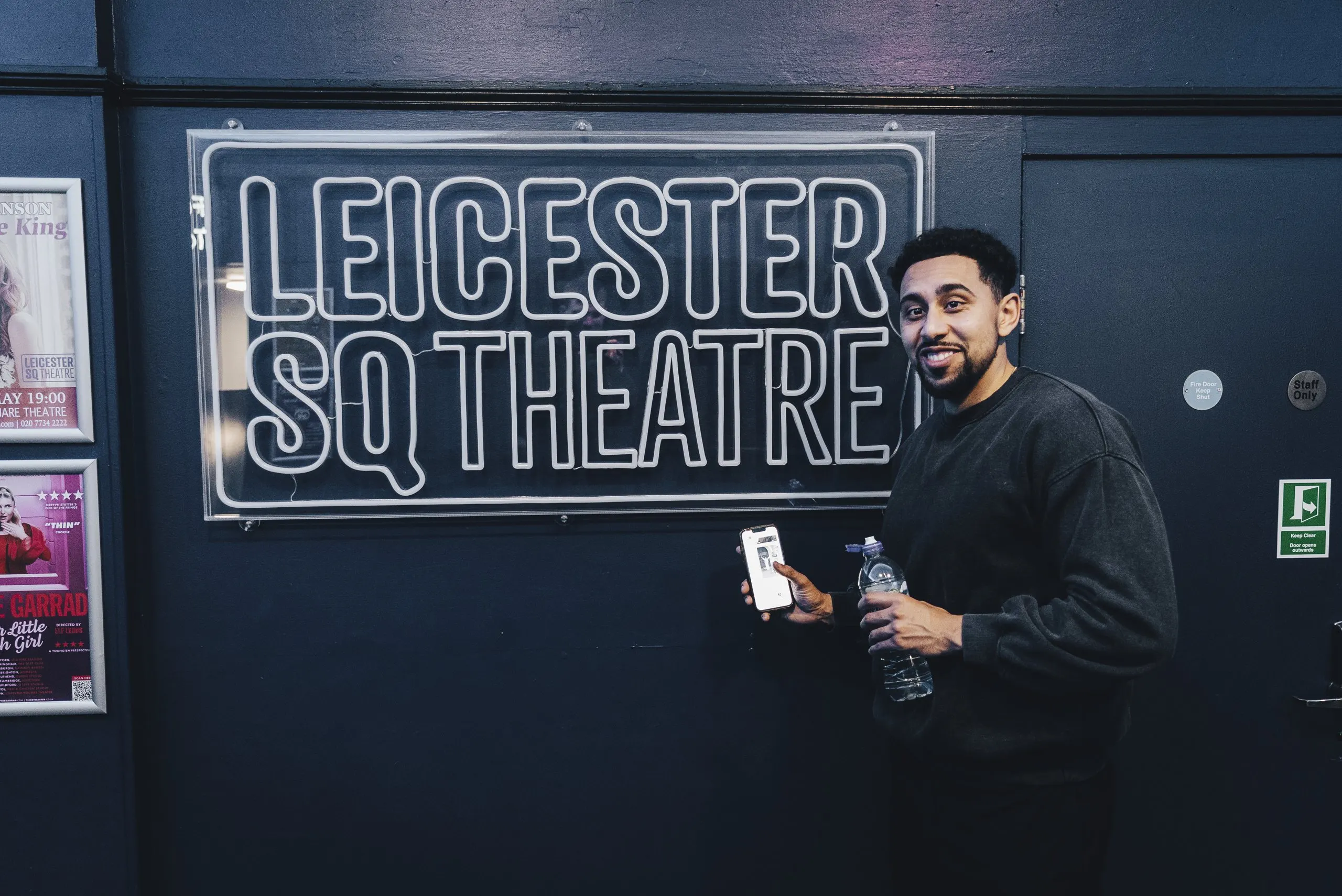 Jahmal Crowe by the Leicester Sq Theatre sign